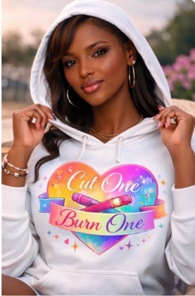 Woman wearing a white hoodie with a colorful graphic design.
